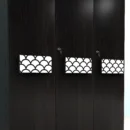 Pristine 3 doors wardrobe closeup view