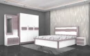 Elegant-full-hydraulic-bedroom-set-in-a-rich-woodgrain-finish-featuring-a-king-bed-3-door-wardrobe-dresser-with-mirror-and-2-drawer-bedside-table-for-a-cohesive-a-scaled.webp