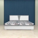 Scanty-King-size-hydraulic-bed-in-deep-walnut-tone-with-bold-concentric-gold-circle-design-on-both-headboard-and-footboard.webp
