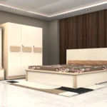 full-hydraulic-bedroom-set-in-dark-wood-finish-featuring-a-cushioned-headboard-bed-3-door-wardrobe-dresser-with-mirror-and-2-drawer-bedside-table-scaled.webp
